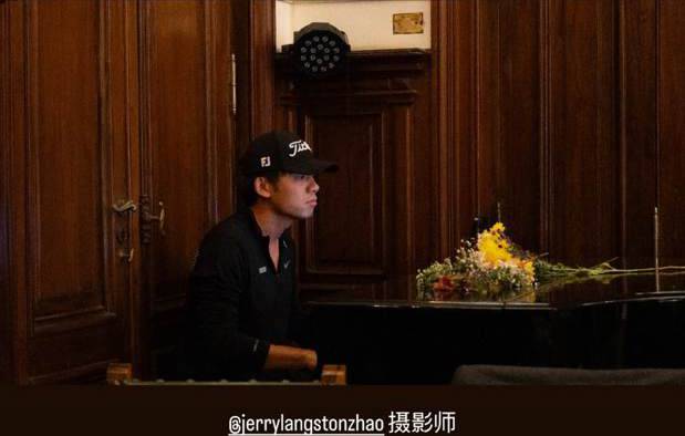 Dexter playing piano in a winery cellar