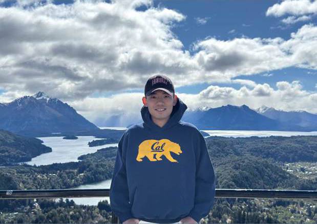 Dexter in front of the lakes and mountains of Bariloche