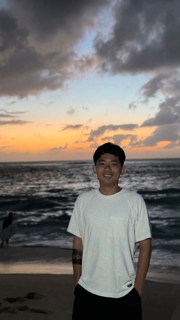 Dexter on a beach at sunset in Hawaii